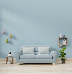 Modern living room interior with sofa lamp and green plants on blue wall background, 3d rendering.