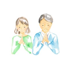 合掌する男性と女性

