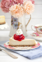 Obraz na płótnie Canvas Freshly Baked Cherry Cheesecake on a Plate