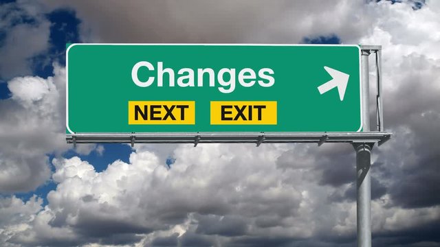 Changes Next Exit Highway Sign with Time Lapse Clouds