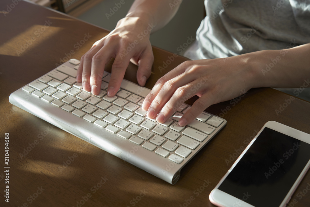 Poster hand typing keyboard. searching browsing internet data information.