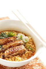 Chinese food, sesame chicken wing on ramen noodles