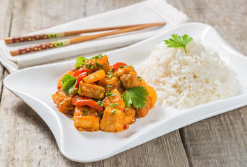 Pork in sweet and sour sauce. A dish of Chinese national cuisine. 