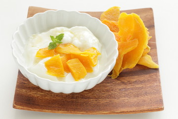 dried mango and mint on yogurt