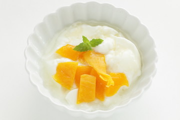 dried mango and mint on yogurt
