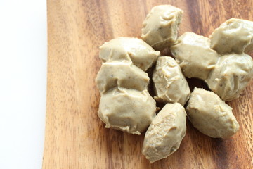 Asian food ingredient, sardines fish ball on wooden plate