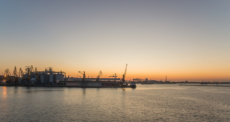 Fototapeta na wymiar Seaport at Sunset