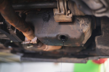 removing used engine oil