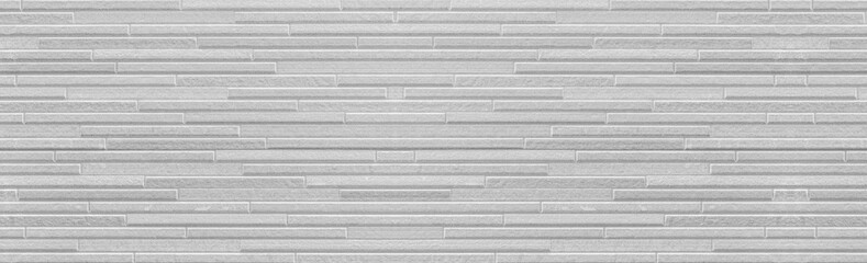 Naklejka premium Panorama współczesnego białego kamiennego muru i tła