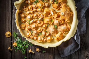 Top view of tarts made of wild mushrooms and herbs