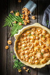 Homemade and tasty tarts with noble mushrooms and thyme