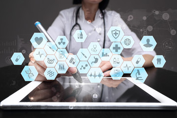 Medical doctor working with modern computer virtual screen interface. Medicine technology and...