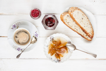 Breakfast with coffee on old rural table.