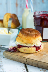 Traditional English scones with strawberry jam and clotted cream