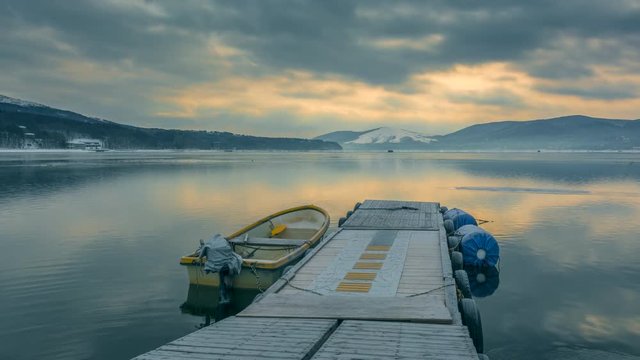 4k Timelapse Sunrise Scene of Small Fishing Port at Yamanashi Lake with mt. Fuji is Background, Winter Japan