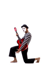 Fototapeta premium Mime playing guitar isolated on white