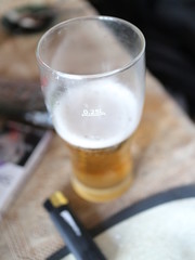 a glass of beer on the table