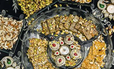 Asian food served on black stone, top view. Chinese and vietnamese cuisine set.