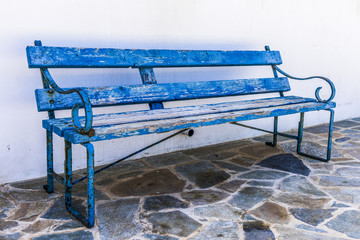 The old bench near white wall Church