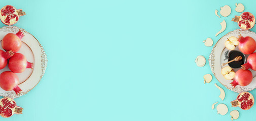 Rosh hashanah (jewish New Year holiday) concept. Pomegranate raditional symbol.