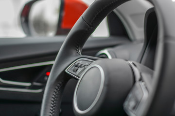 Modern steering wheel leather car interior close