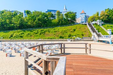 View of shore with hotels and historic buildings from pier in Ostseebad Sellin, Ruegen island, Baltic Sea, Germany