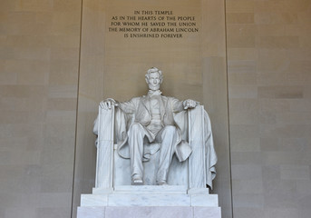 Washington, DC - June 01, 2018: Statues of Abraham Lincoln in Lincoln Memorial.