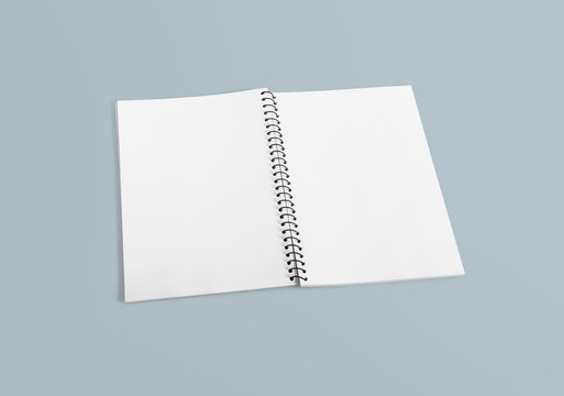 Notebook mockup for your design, image, text or corporate identity details. Vertical blank copybook with metallic silver spiral. Template of organizer or diary isolated on white background. 