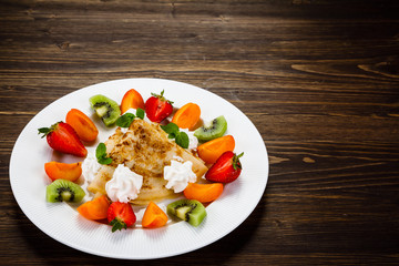 Crepes with fruit and creme