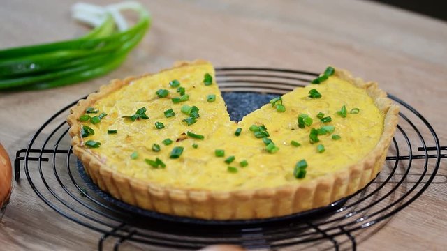 Traditional french cuisine quiche with cheese and onion.