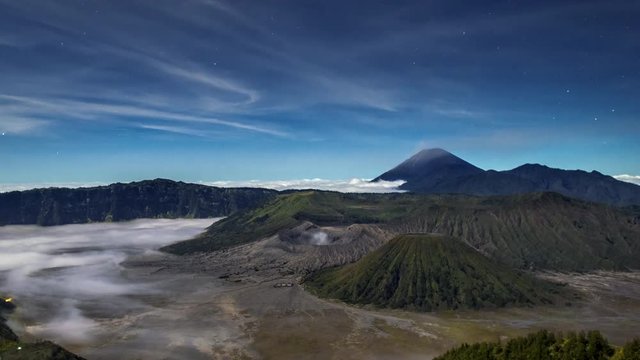 4K Timelapse Moving Star  Night Scene with Mts. Bromo, Semeru, Batok and Widodaren, Tengger Caldera, Indonesia