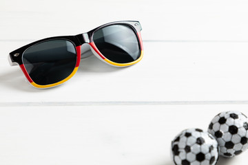 german party decoration with sunglasses and balls