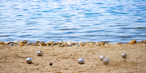 Playing bocce on the beach