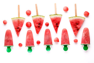 Watermelon slice popsicles and homemade watermelon ice-cream on white background