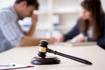 Female lawyer meeting with his male client in the office