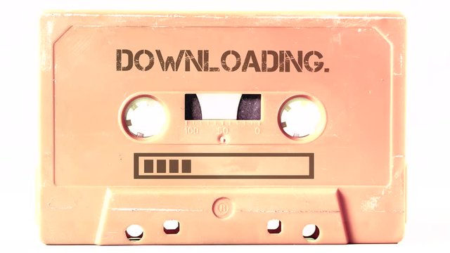 The text Downloading and a progress bar appearing on the surface of a vintage cassette tape from the 1980s era (obsolete music technology). Color: cream, sand. Isolated on white background.
