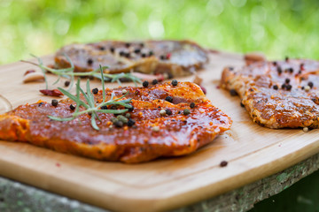 raw meat with herbs and rosemary ready for barbecue