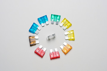 Obraz premium Car fuse. colorful electrical automotive fuses