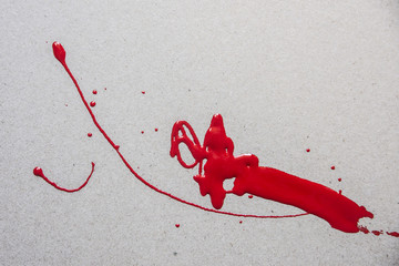 Spilled red paint
