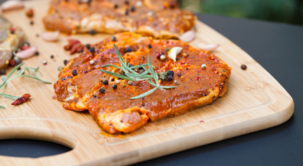 raw meat with herbs and rosemary ready for barbecue