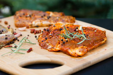 raw meat with herbs and rosemary ready for barbecue