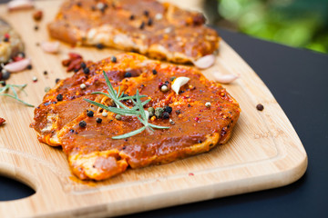 raw meat with herbs and rosemary ready for barbecue