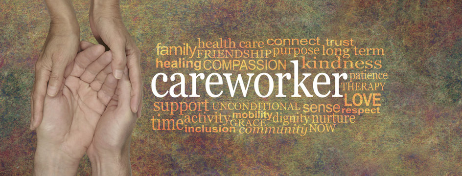 Rustic CAREWORKER word tag cloud female hands gently cupped around male cupped hands beside the word CAREWORKER surrounded by a relevant word cloud on a rustic stone background

