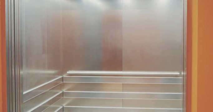 Young woman exits the elevator
