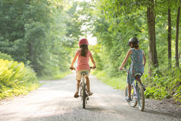 Two Girls Bicycling