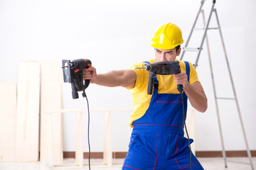 Floor repairman disappointed with his work 