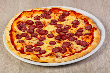 Pizza with sausages