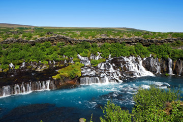 Fototapeta na wymiar waterfall Hraunsfossar in Iceland