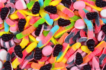 Assorted juicy colorful  gummy candies. Top view.