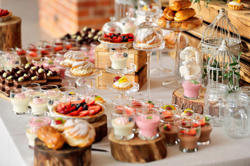 Catering sweets, closeup of various kinds of fruit pastry on event or wedding reception - 210532406